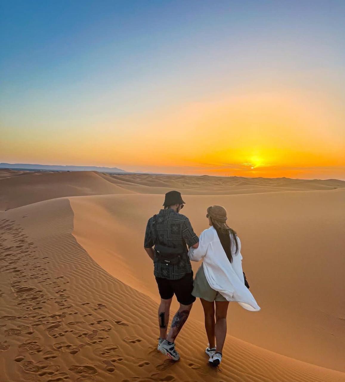 Riding into the golden dunes